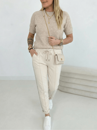 Beige Stretchhose, mit Pailletten Streifen an der seite der Beine lang
